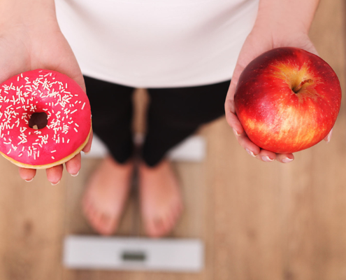 A choice between doughnut and apple